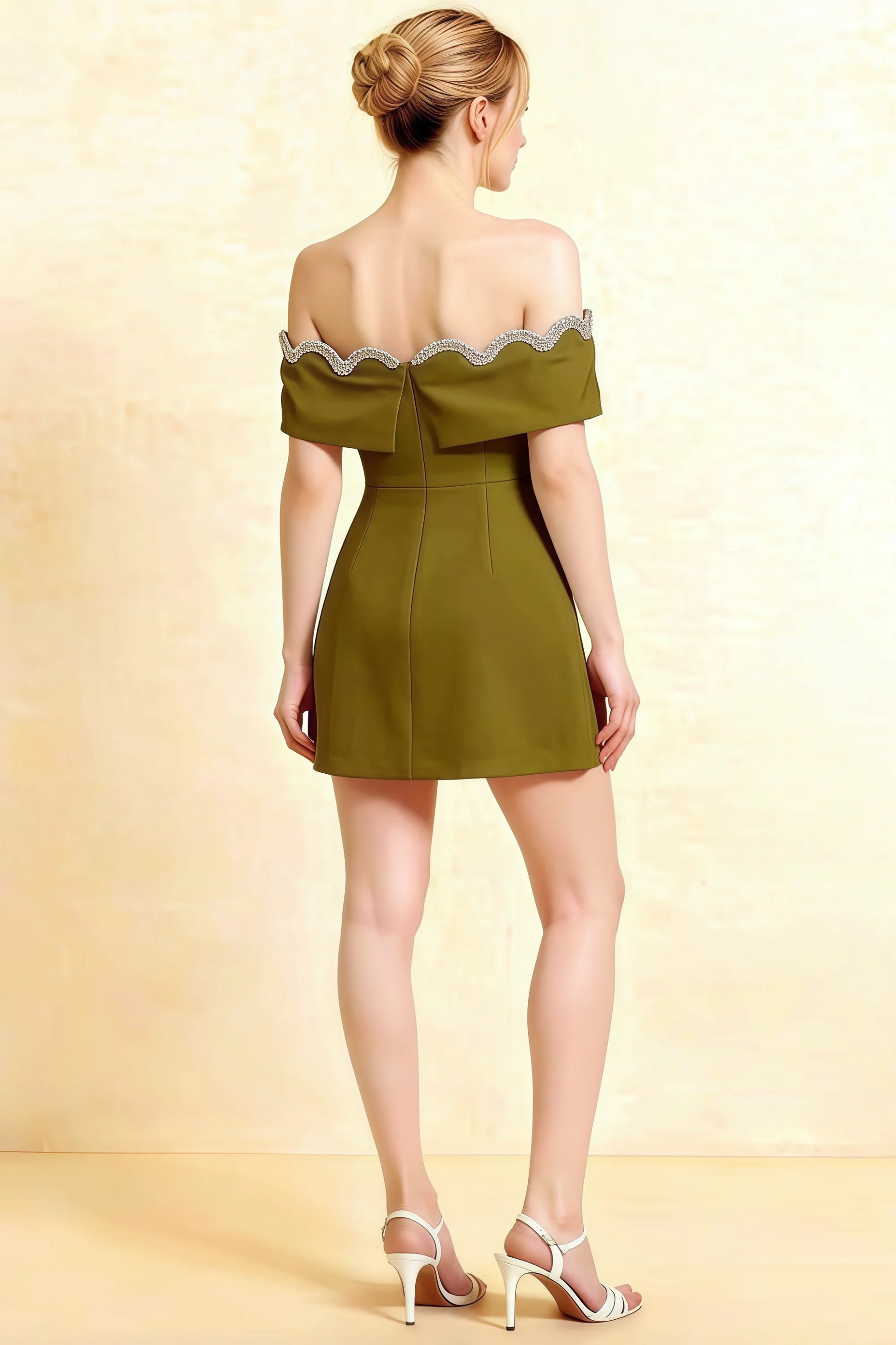 Back view of olive crepe christy dress featuring lace-up back detail and scalloped hem.