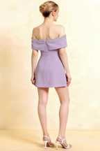 Back view of Christy wisteria prom dress featuring delicate wave-shaped rhinestone embellishments and concealed back zipper.