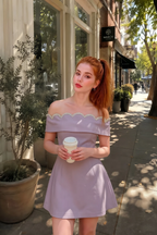 Real customer wearing Christy lilac off-shoulder dress for a casual coffee run, showcasing the flowy A-line silhouette.