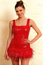 Elegant model posing in Cindy red sequin square neck mini dress feather hem detail fashion photography