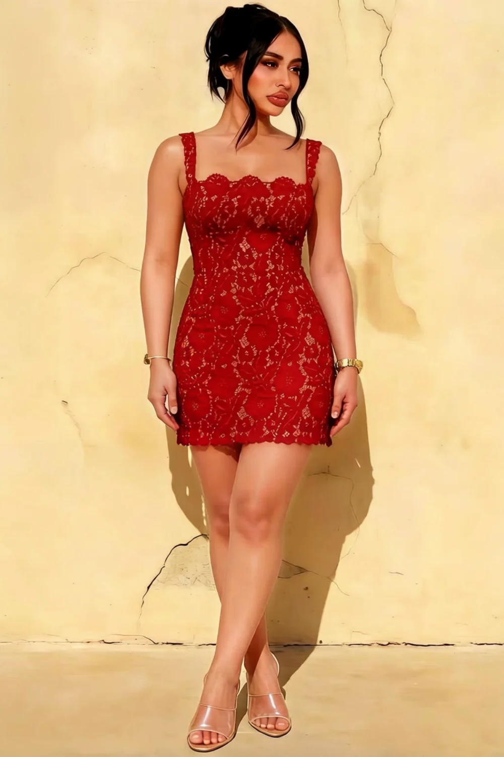 Plus size model wearing Claire red lace square neck mini dress against textured wall for inclusive semi-formal prom fashion