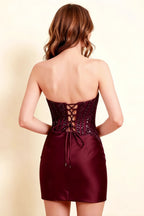 Close up back detail of Clara burgundy lace corset dress with ribbon tie fastening and open back design