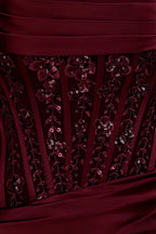 Macro close up fabric detail of Clara dress showcasing intricate floral sequin embroidery on satin lace overlay