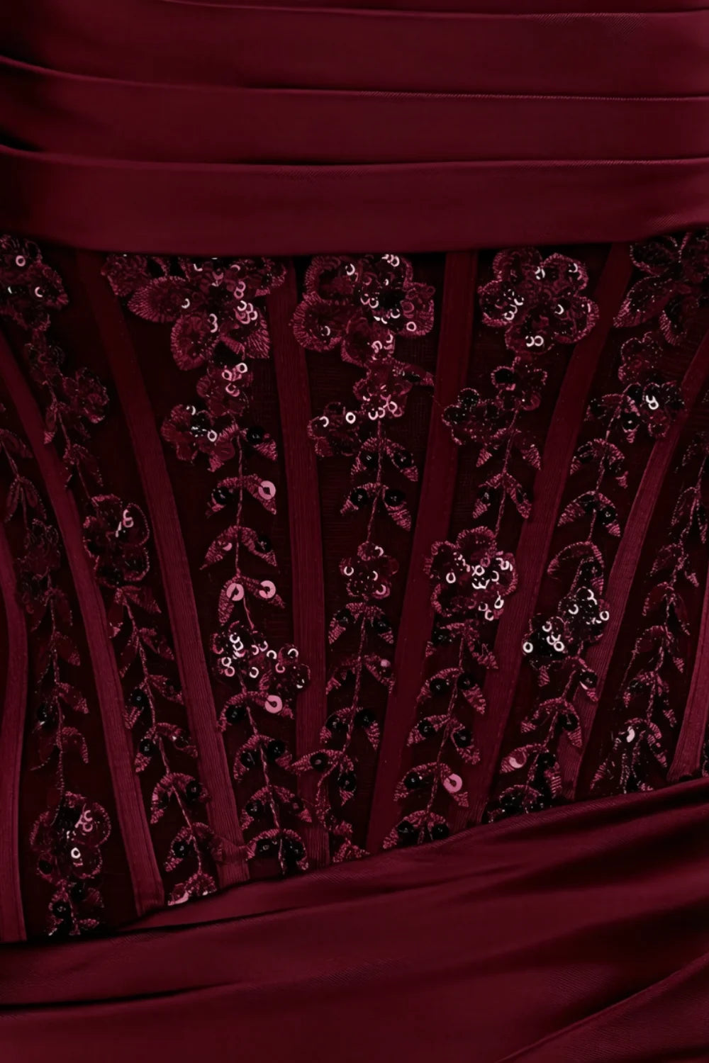 Macro close up fabric detail of Clara dress showcasing intricate floral sequin embroidery on satin lace overlay