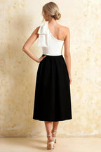 Giselle White and Black Asymmetrical Neck Midi Dress with Bow
