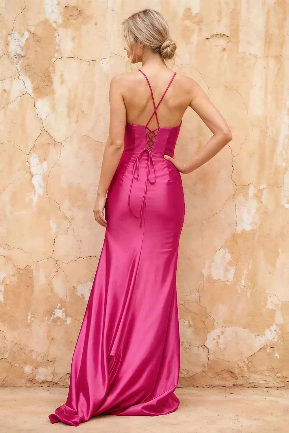 Translation missing: en.Full-length back view of the Karen hot pink dress, showing crossed straps, back lacing and the sweep train. content.product_image_secondary