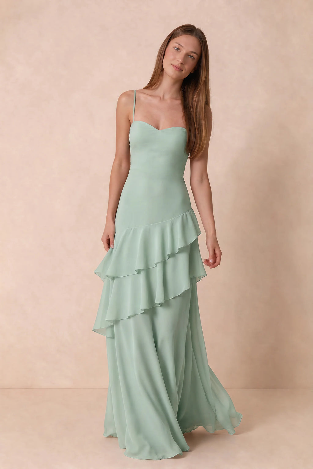 Front studio view of Rosalie agave tiered ruffle maxi dress with a long flowing skirt