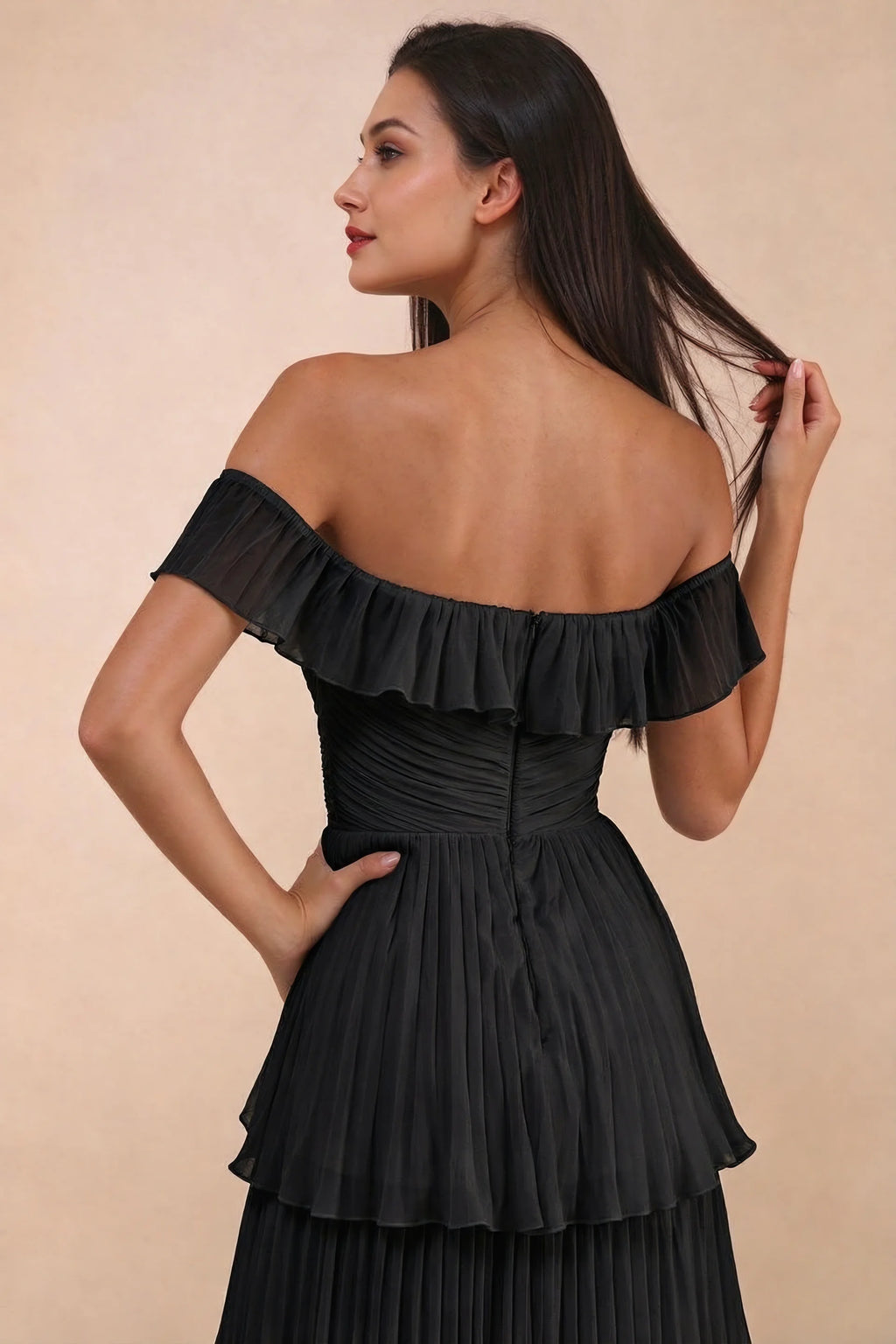 Close-up of back neckline ruffle, ruching and centre-back zipper of Seraphina black tiered ruffle maxi dress