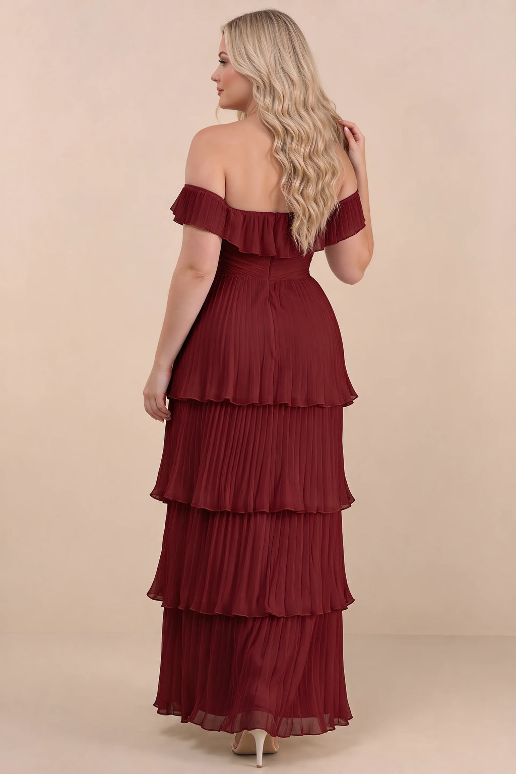 Rear view on a second model of Seraphina burgundy tiered ruffle maxi dress with a long flowing skirt