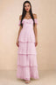 Front studio view of Seraphina candy pink tiered ruffle maxi dress with a long flowing skirt