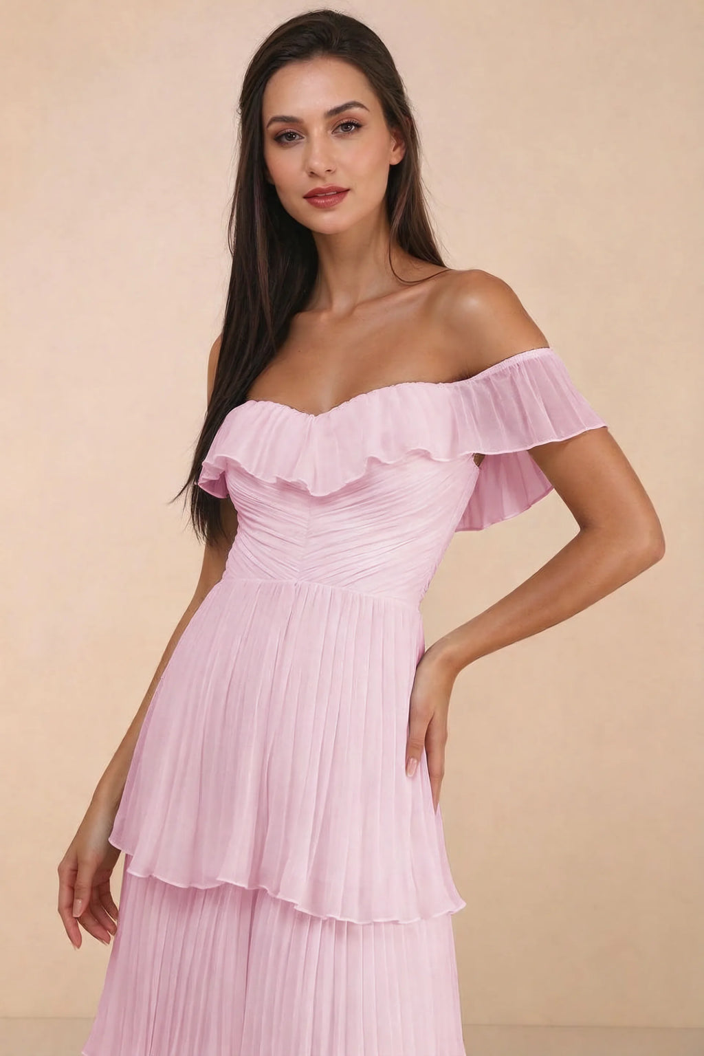 Close-up of shallow sweetheart neckline and off-shoulder ruffle and tiered skirt of Seraphina candy pink tiered ruffle maxi dress