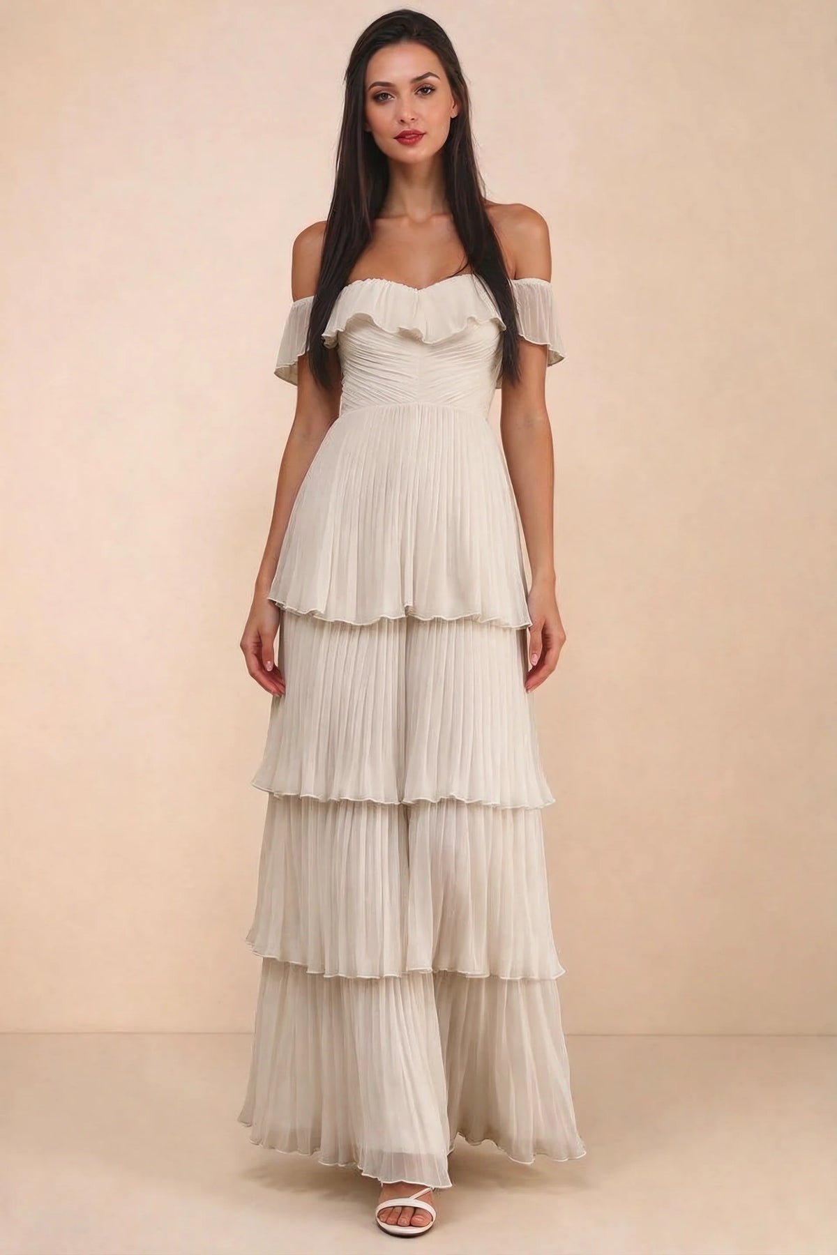 Front studio view of Seraphina cream tiered ruffle maxi dress with a long flowing skirt