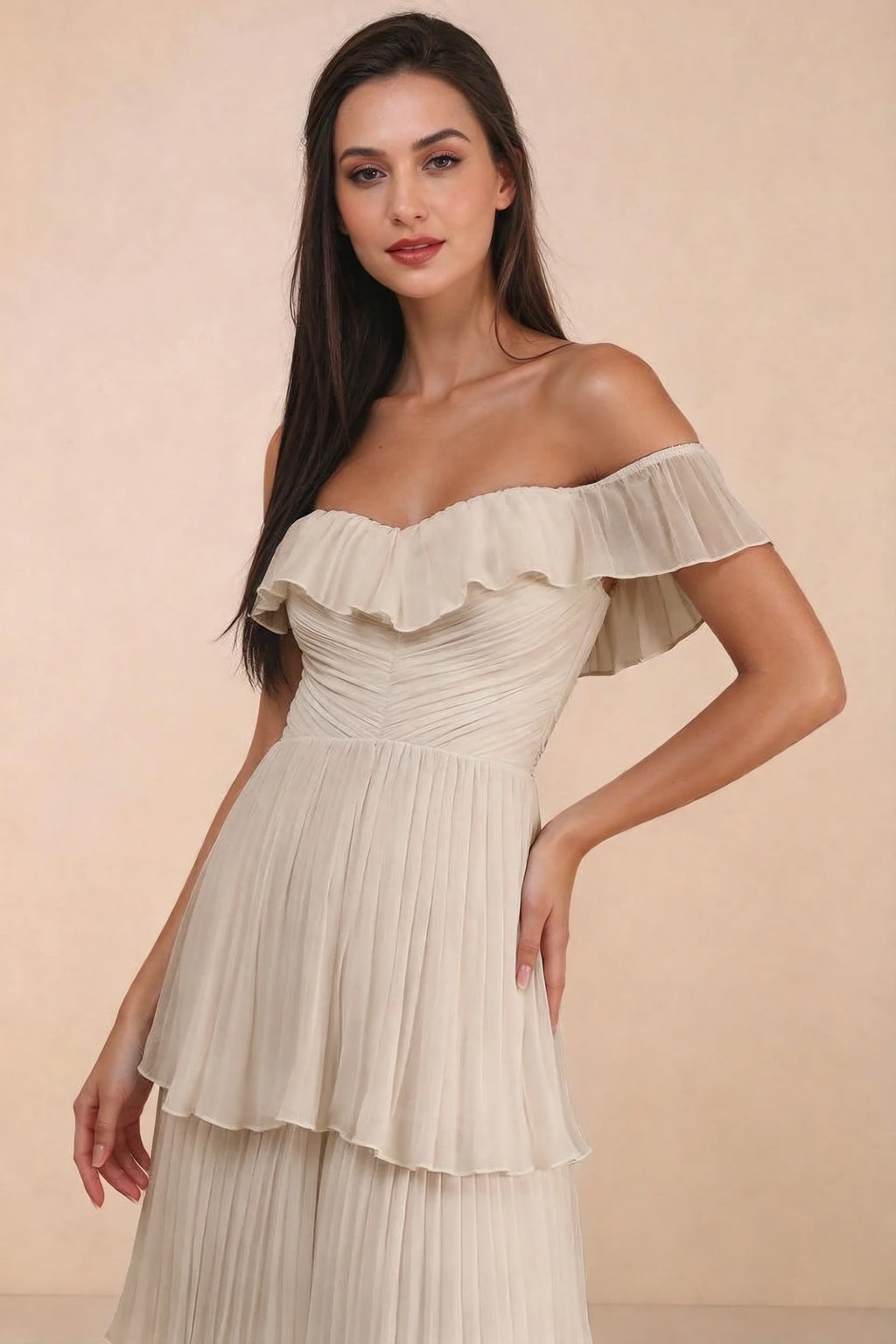 Close-up of shallow sweetheart neckline and off-shoulder ruffle and tiered skirt of Seraphina cream tiered ruffle maxi dress