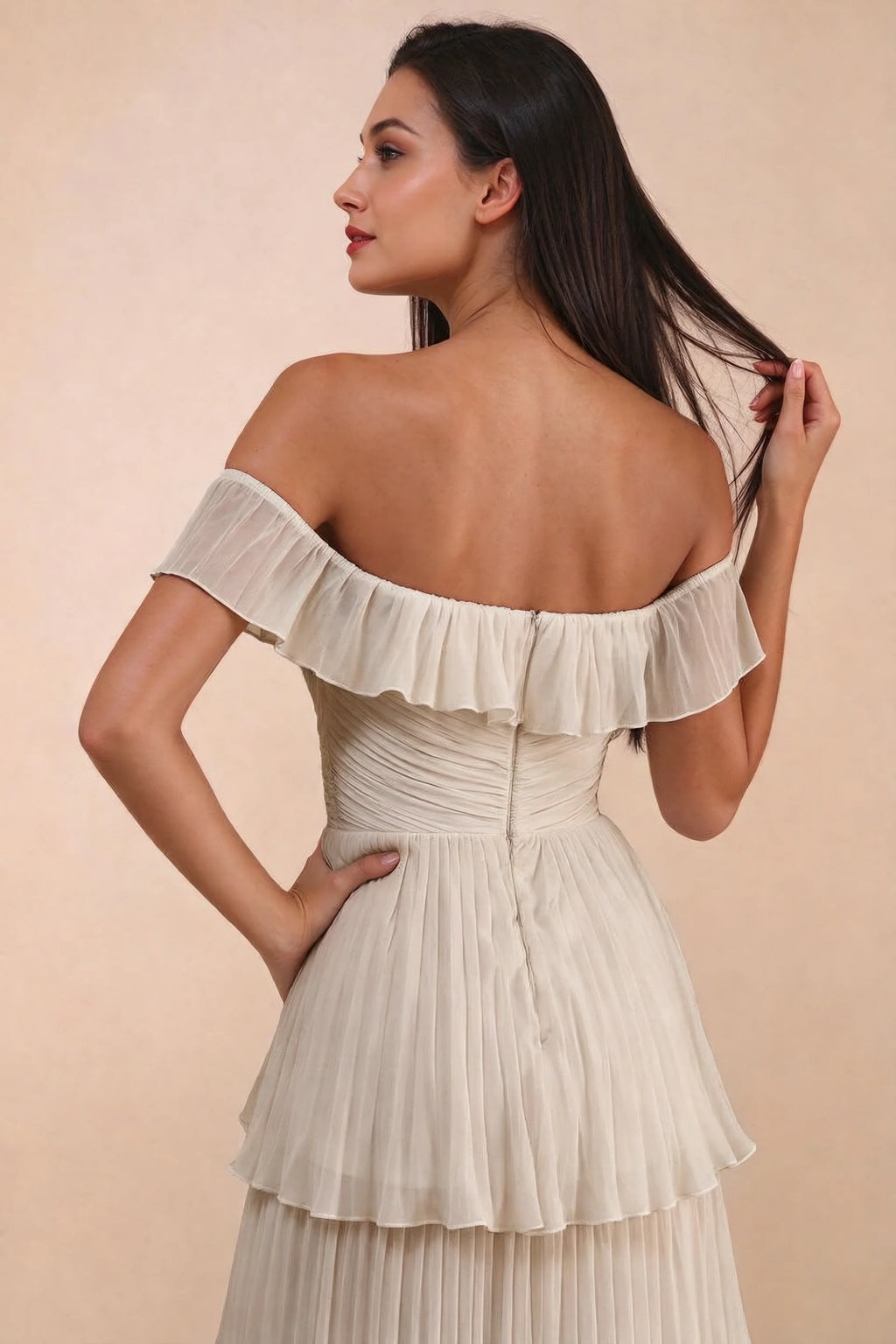 Close-up of back neckline ruffle, ruching and centre-back zipper of Seraphina cream tiered ruffle maxi dress