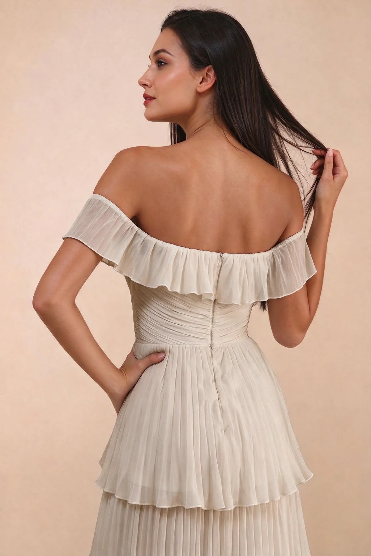 Close-up of back neckline ruffle, ruching and centre-back zipper of Seraphina cream tiered ruffle maxi dress