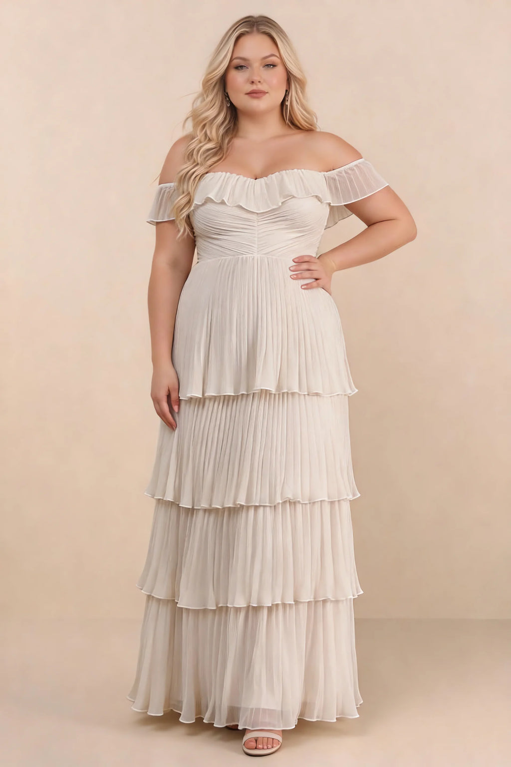 Front view on a second model of Seraphina cream tiered ruffle maxi dress with a long flowing skirt