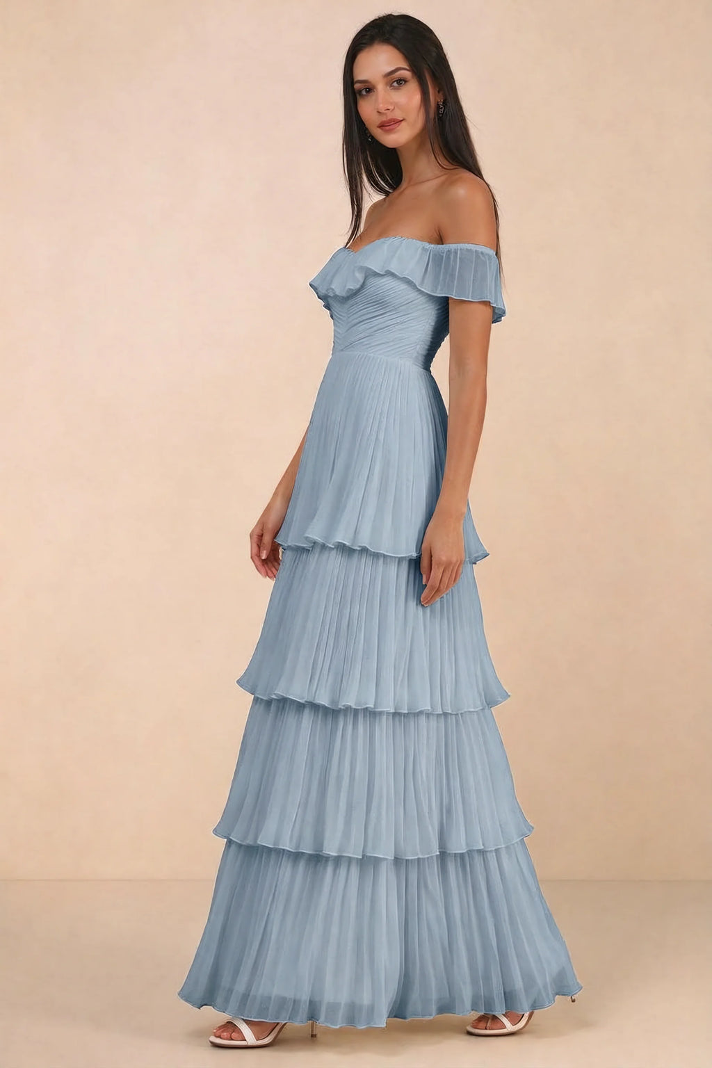 Front studio view of Seraphina dusty blue tiered ruffle maxi dress with a long flowing skirt