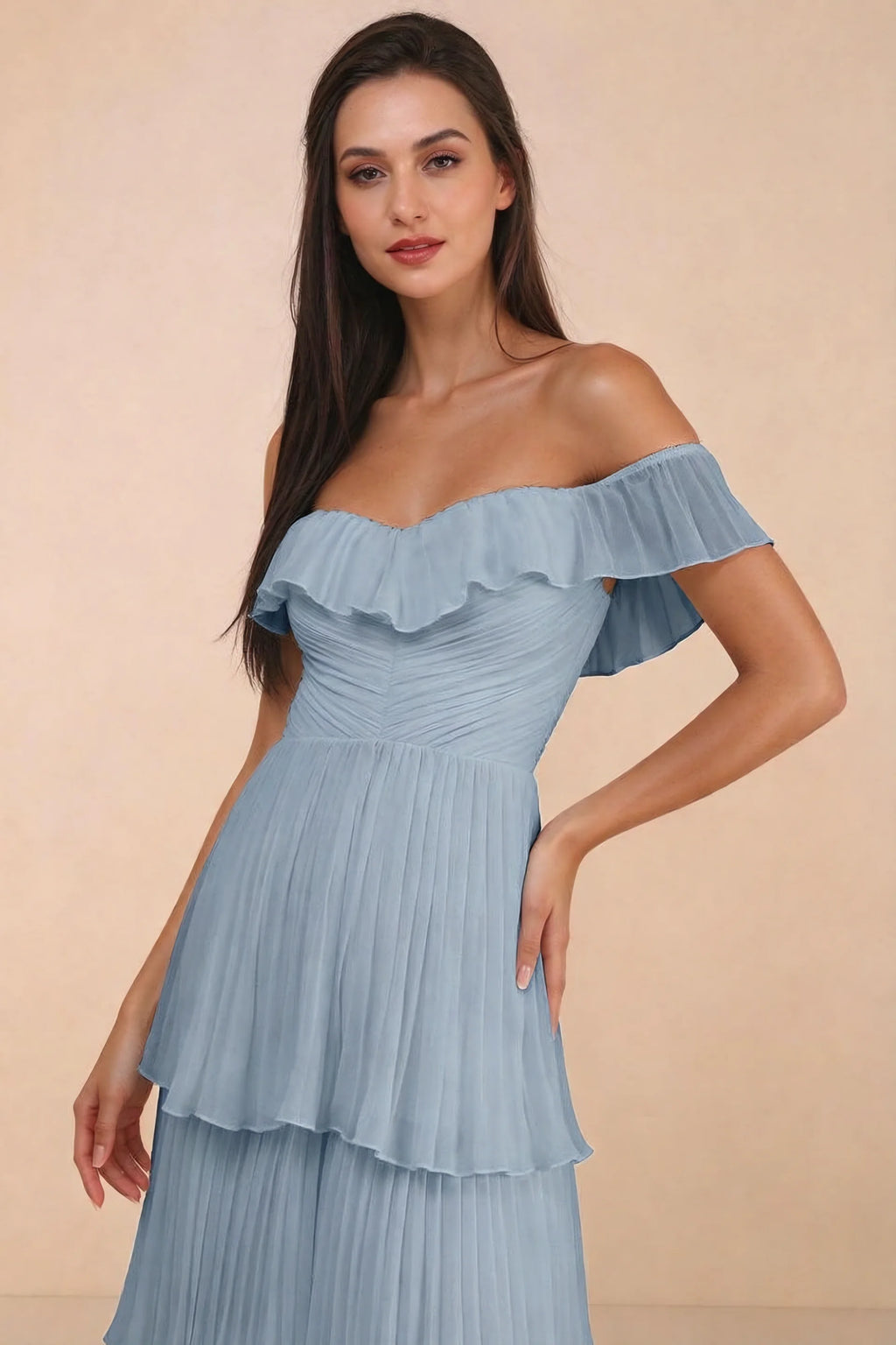 Close-up of shallow sweetheart neckline and off-shoulder ruffle and tiered skirt of Seraphina dusty blue tiered ruffle maxi dress