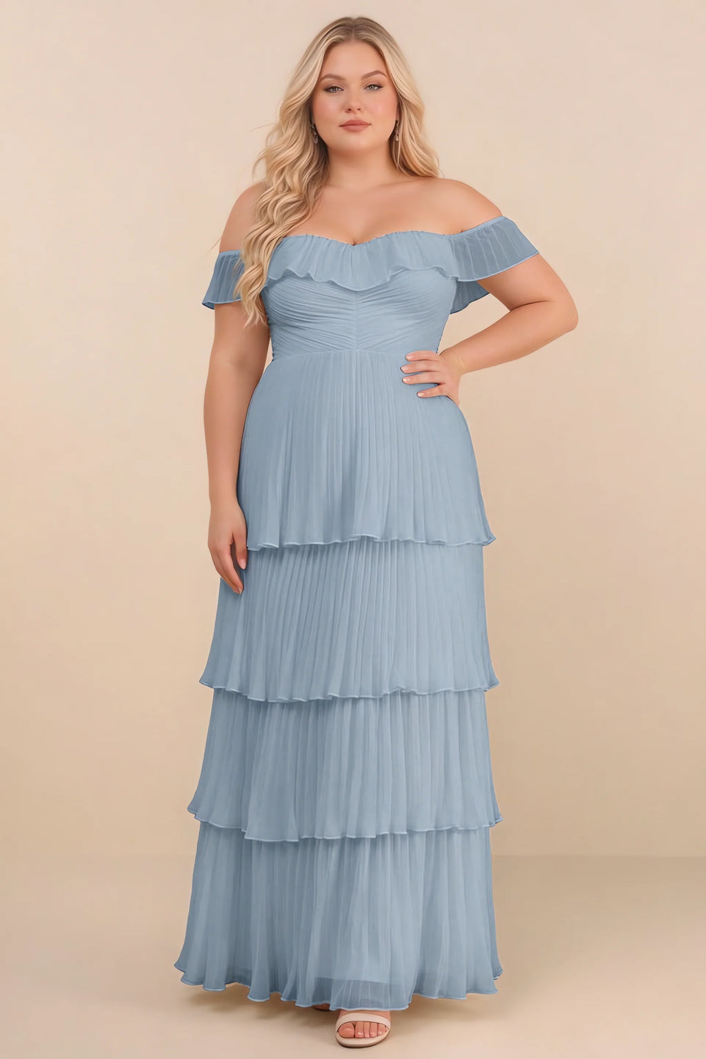 Front view on a second model of Seraphina dusty blue tiered ruffle maxi dress with a long flowing skirt