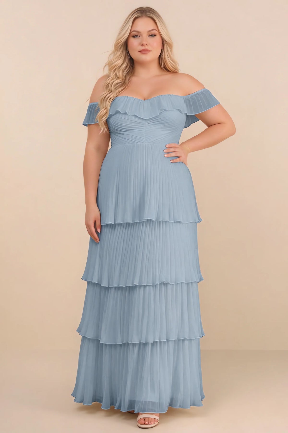 Front view on a second model of Seraphina dusty blue tiered ruffle maxi dress with a long flowing skirt