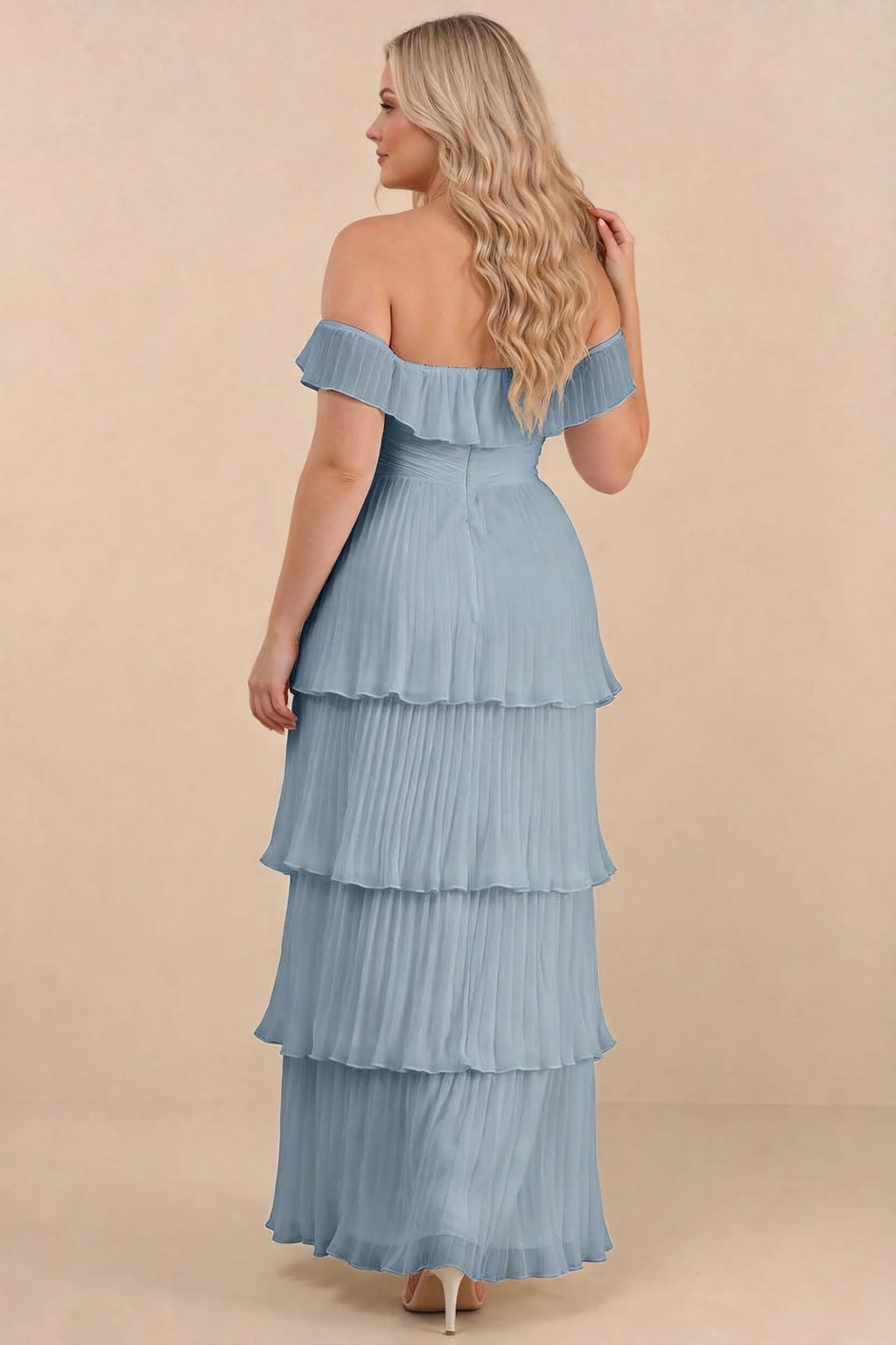 Rear view on a second model of Seraphina dusty blue tiered ruffle maxi dress with a long flowing skirt