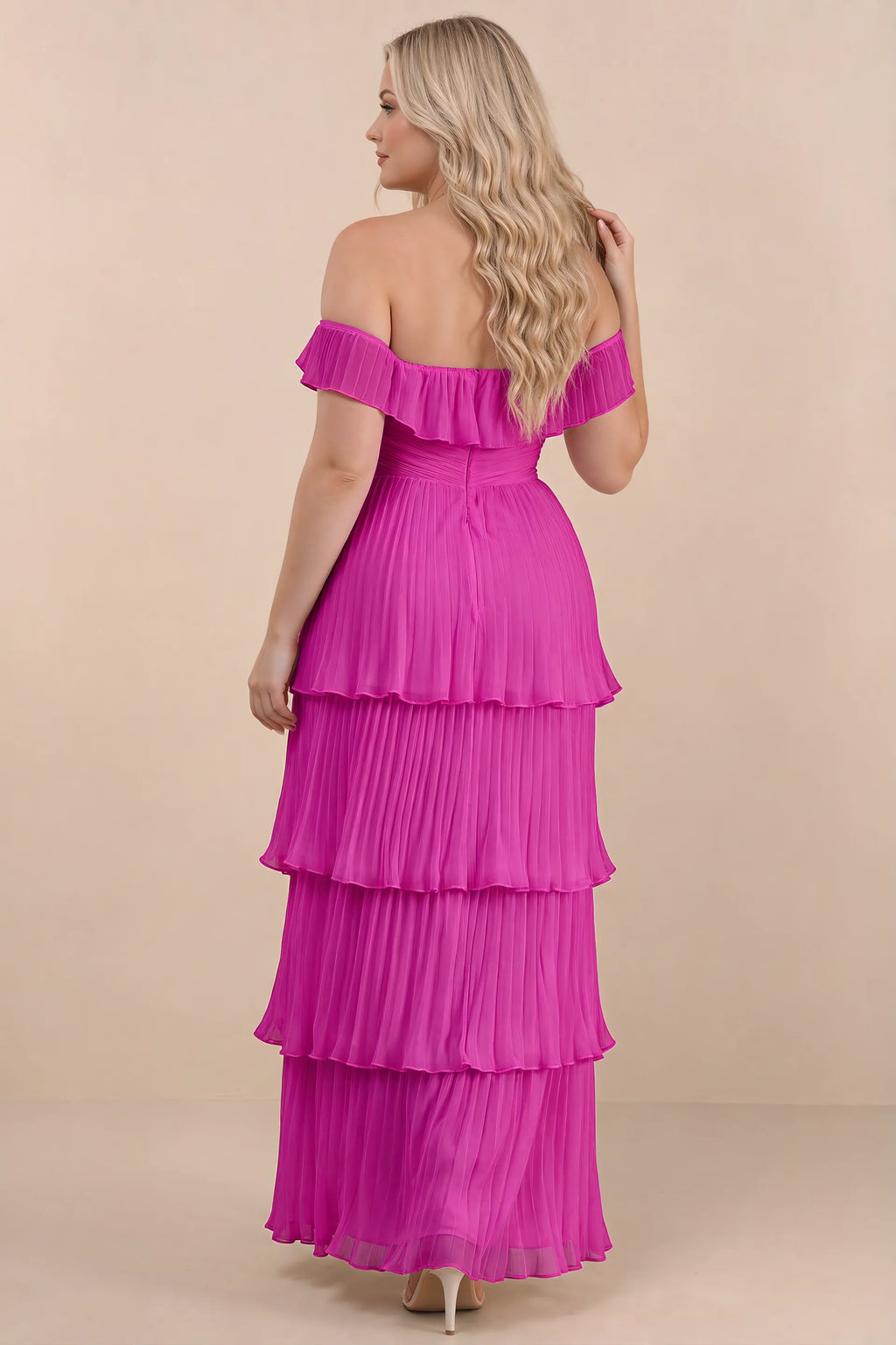 Rear view on a second model of Seraphina fuchsia tiered ruffle maxi dress with a long flowing skirt