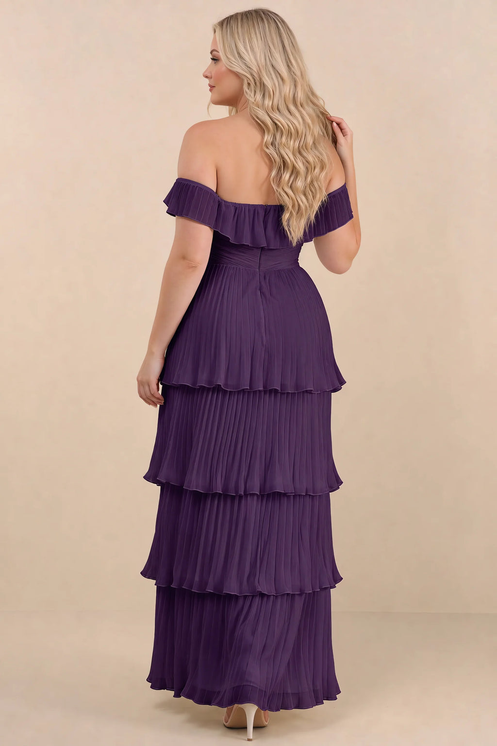 Rear view on a second model of Seraphina grape tiered ruffle maxi dress with a long flowing skirt