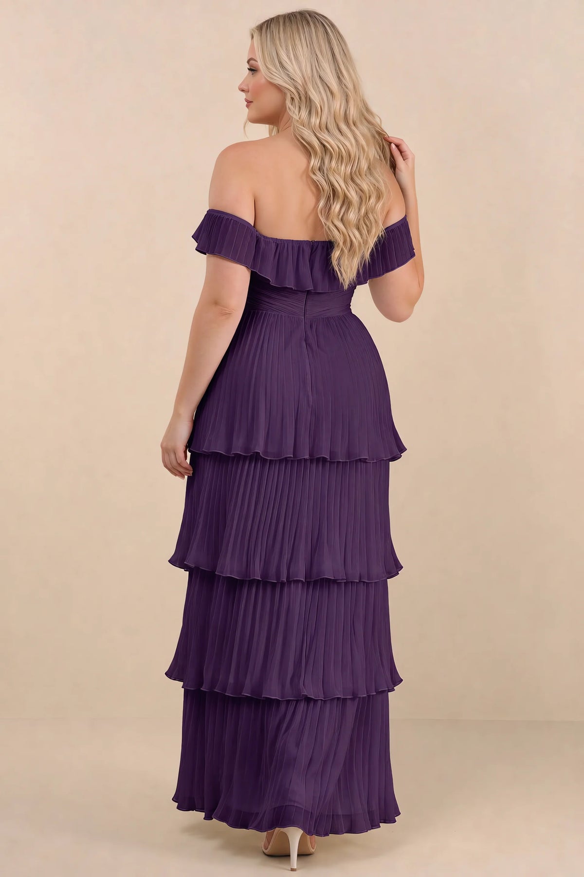 Rear view on a second model of Seraphina grape tiered ruffle maxi dress with a long flowing skirt
