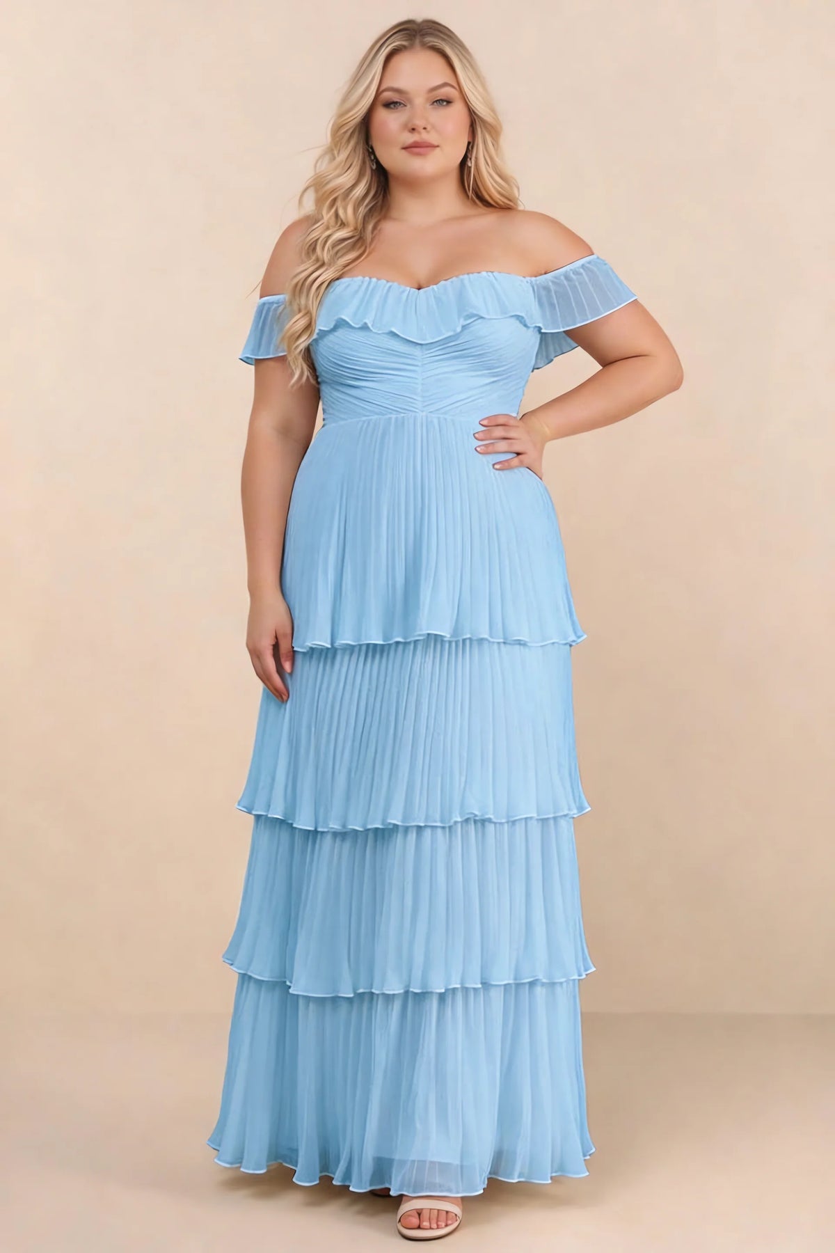 Front view on a second model of Seraphina haze blue tiered ruffle maxi dress with a long flowing skirt