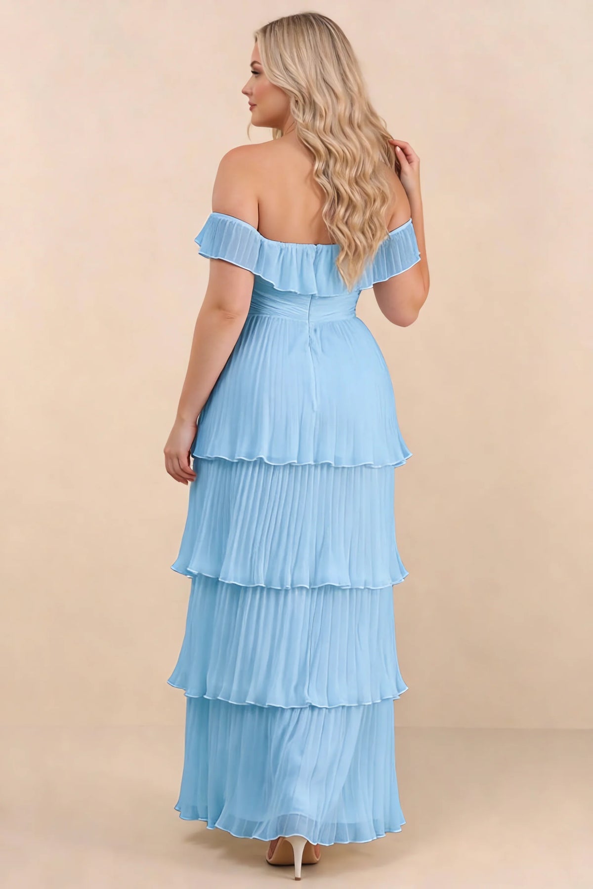 Rear view on a second model of Seraphina haze blue tiered ruffle maxi dress with a long flowing skirt
