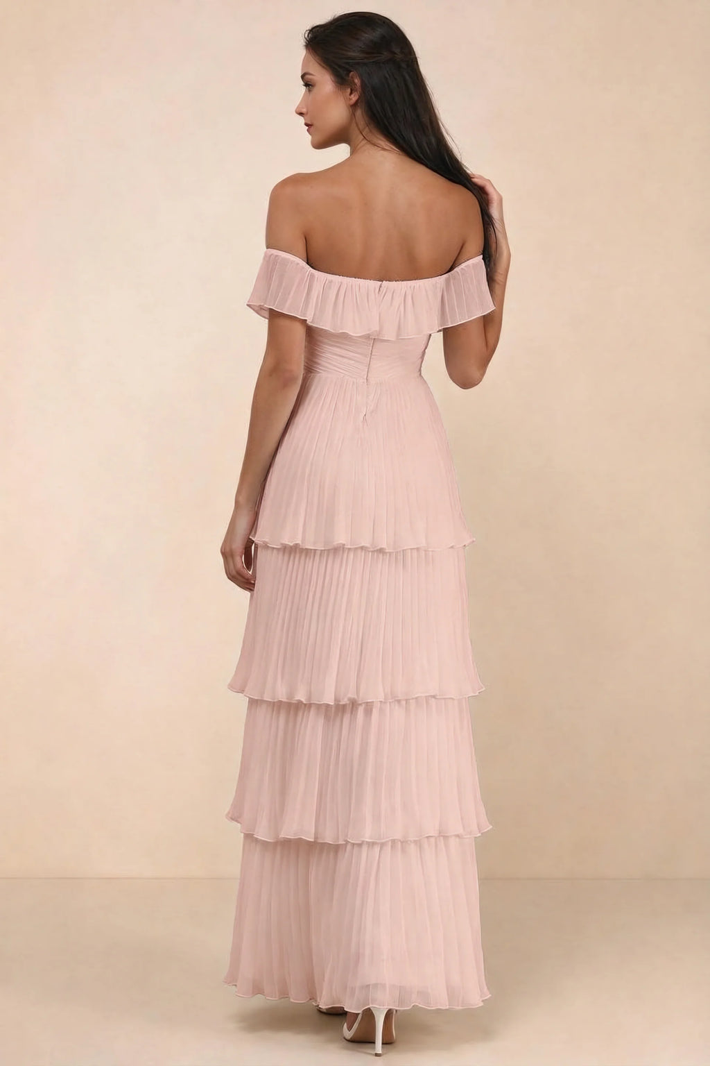 Rear studio view of Seraphina haze pink tiered ruffle maxi dress with a long flowing skirt