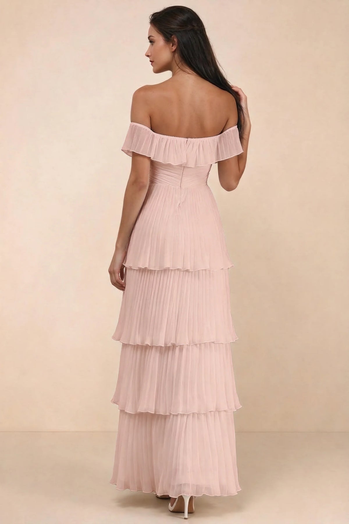 Rear studio view of Seraphina haze pink tiered ruffle maxi dress with a long flowing skirt