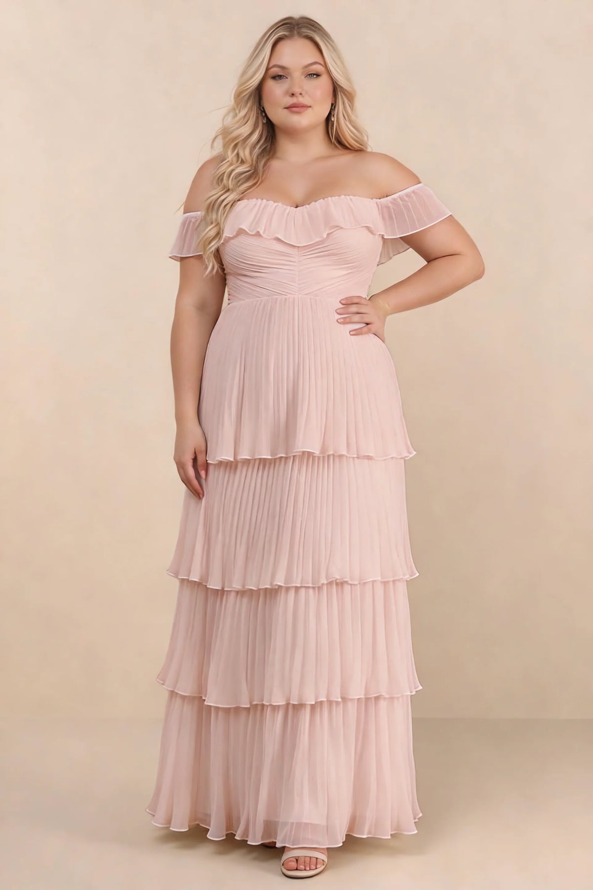 Front view on a second model of Seraphina haze pink tiered ruffle maxi dress with a long flowing skirt