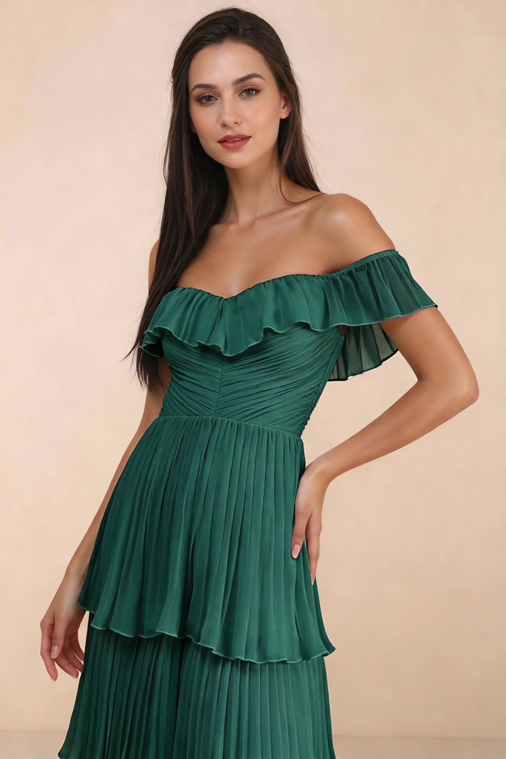 Close-up of shallow sweetheart neckline and off-shoulder ruffle and tiered skirt of Seraphina hunter green tiered ruffle maxi dress