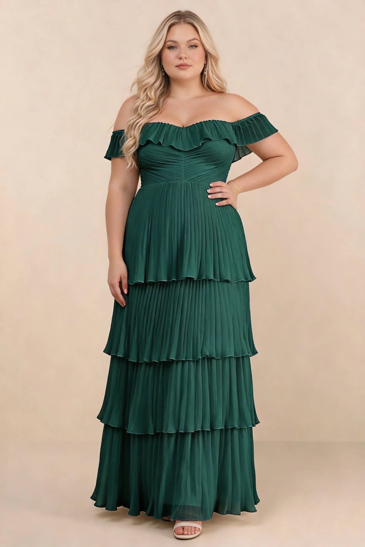 Front view on a second model of Seraphina hunter green tiered ruffle maxi dress with a long flowing skirt