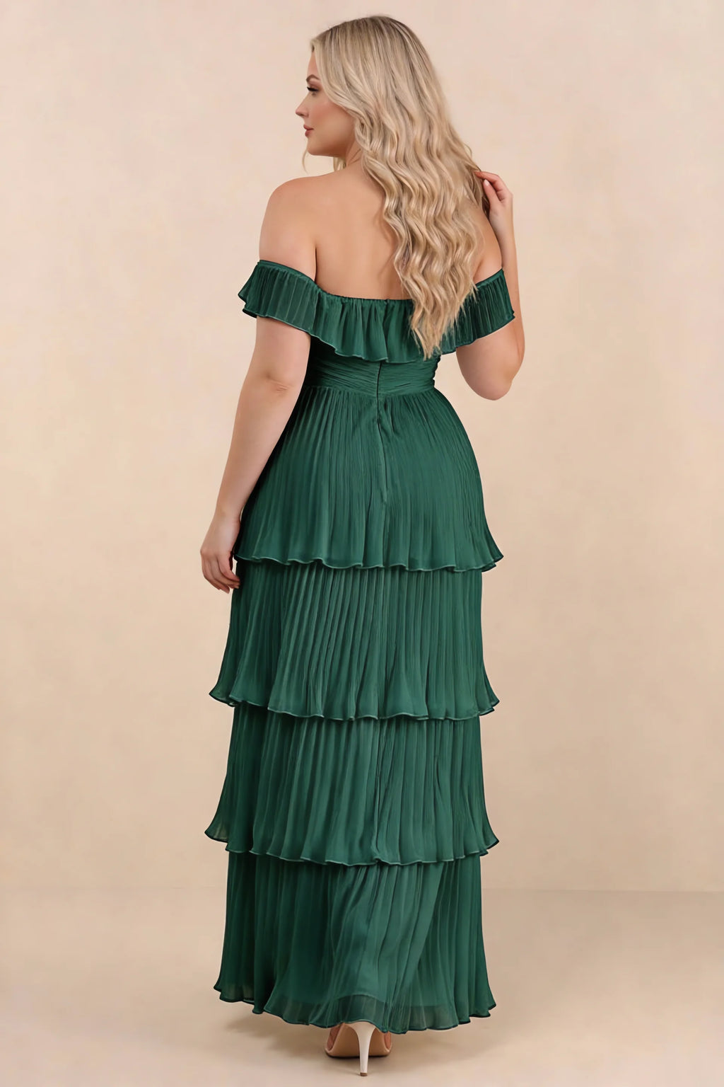 Rear view on a second model of Seraphina hunter green tiered ruffle maxi dress with a long flowing skirt