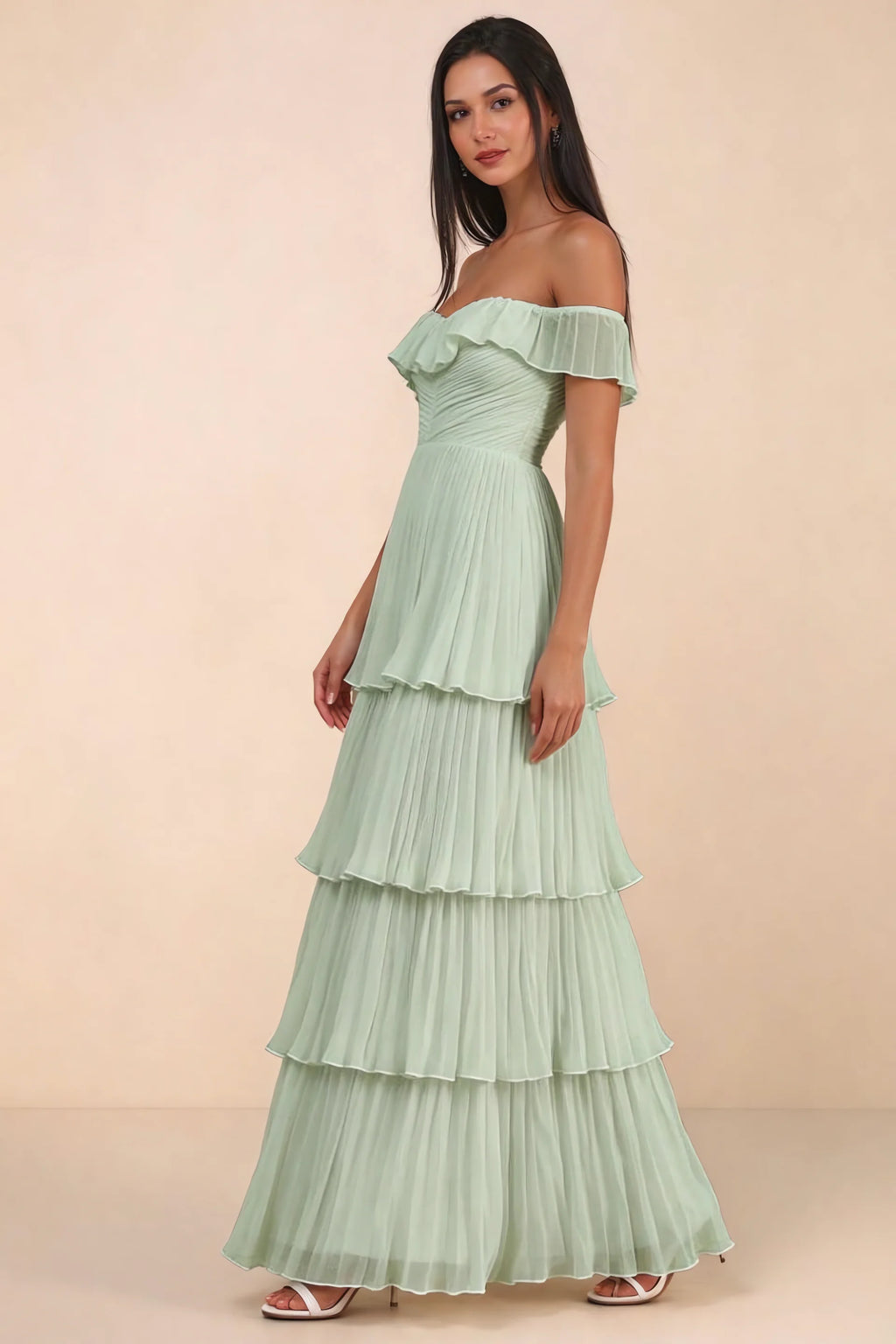 Front studio view of Seraphina light green tiered ruffle maxi dress with a long flowing skirt