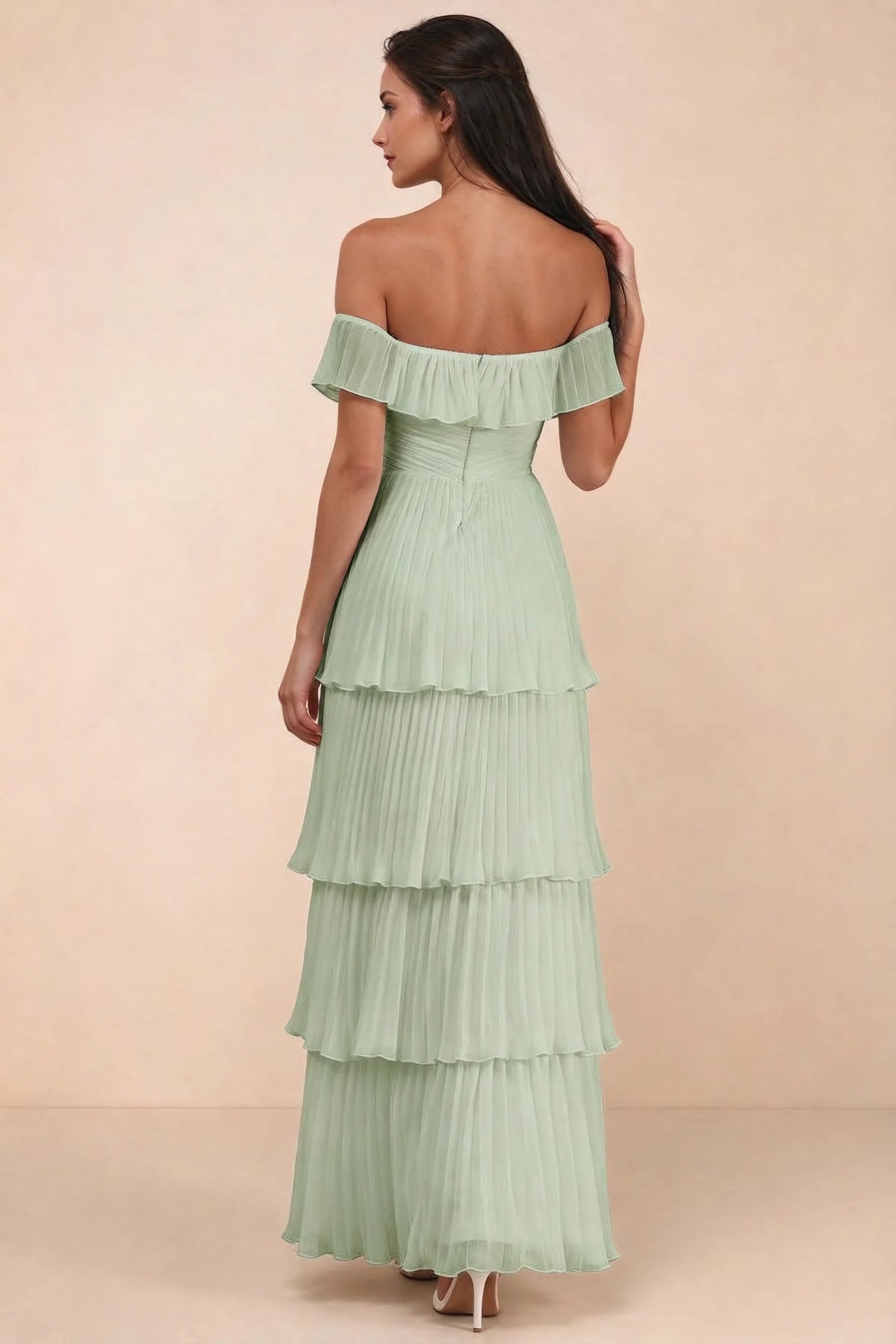 Rear studio view of Seraphina light green tiered ruffle maxi dress with a long flowing skirt