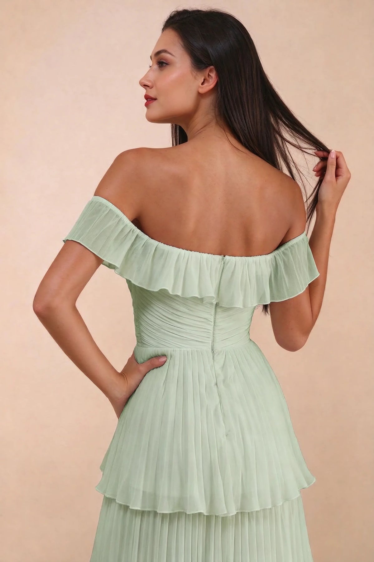Close-up of back neckline ruffle, ruching and centre-back zipper of Seraphina light green tiered ruffle maxi dress