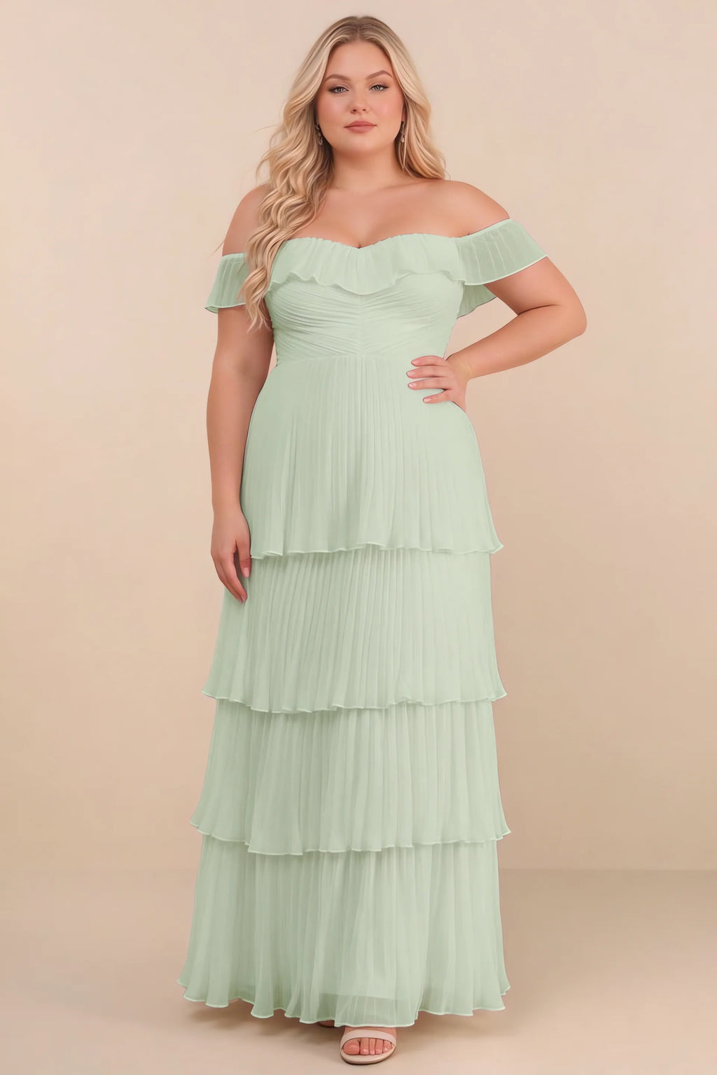 Front view on a second model of Seraphina light green tiered ruffle maxi dress with a long flowing skirt