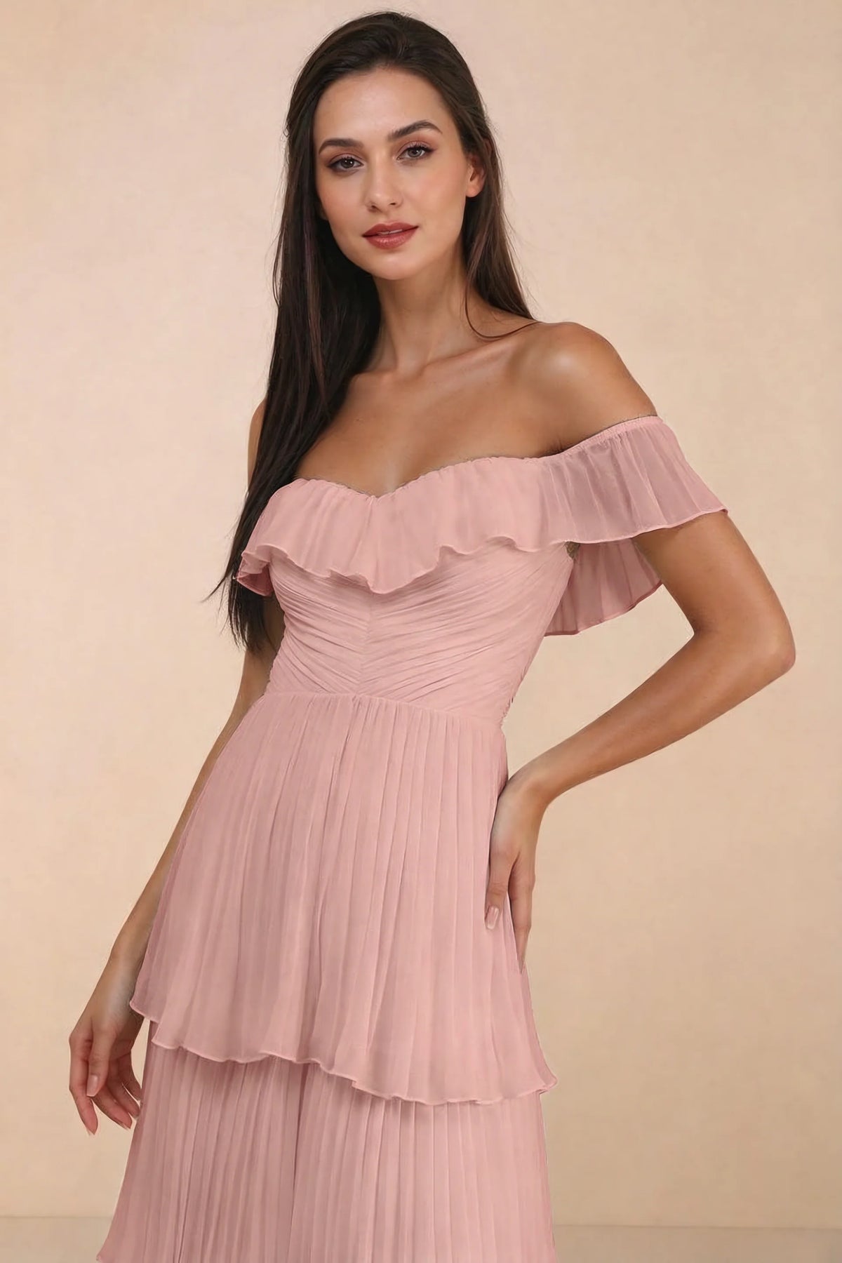 Close-up of shallow sweetheart neckline and off-shoulder ruffle and tiered skirt of Seraphina light pink tiered ruffle maxi dress
