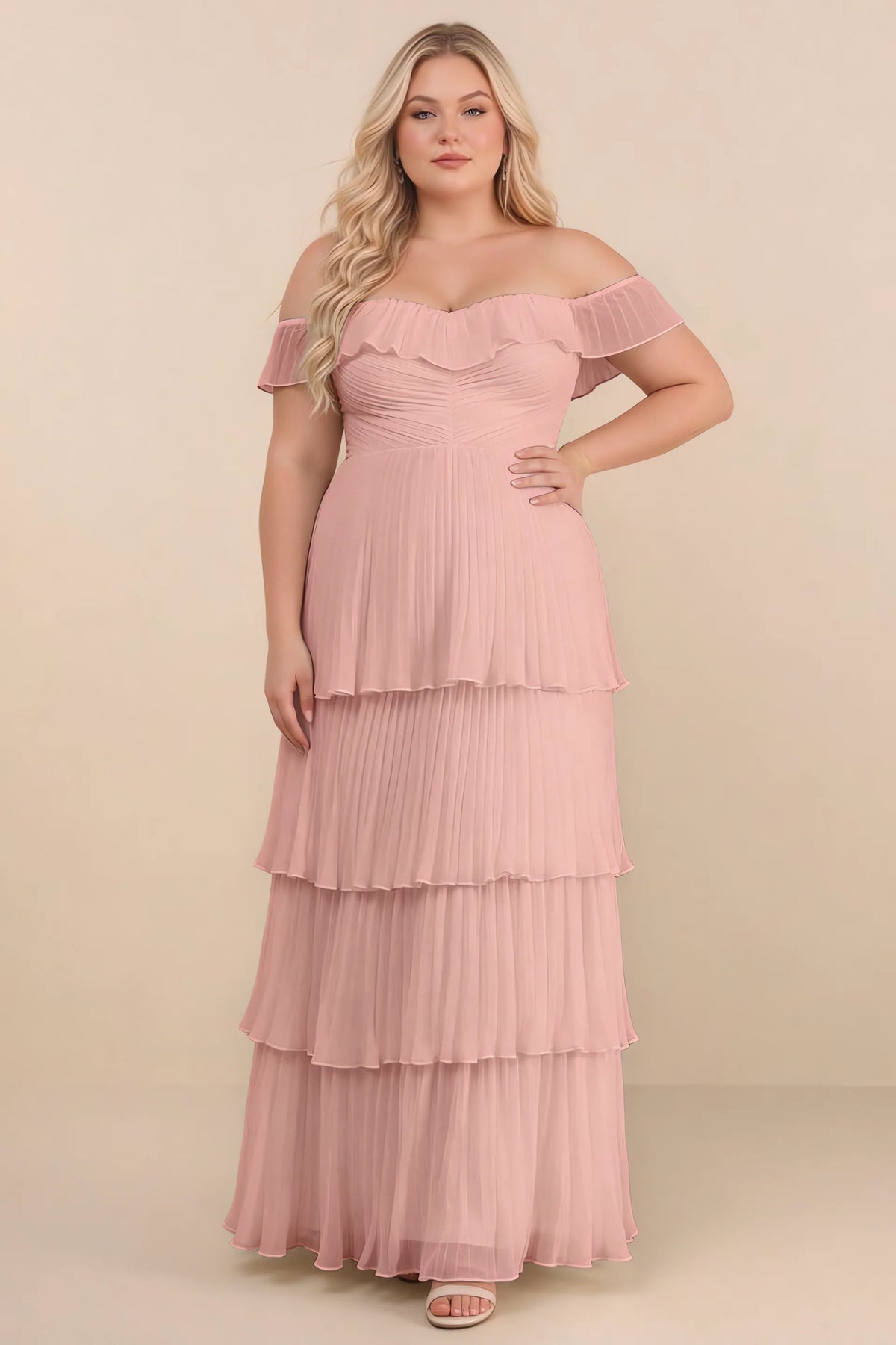 Front view on a second model of Seraphina light pink tiered ruffle maxi dress with a long flowing skirt