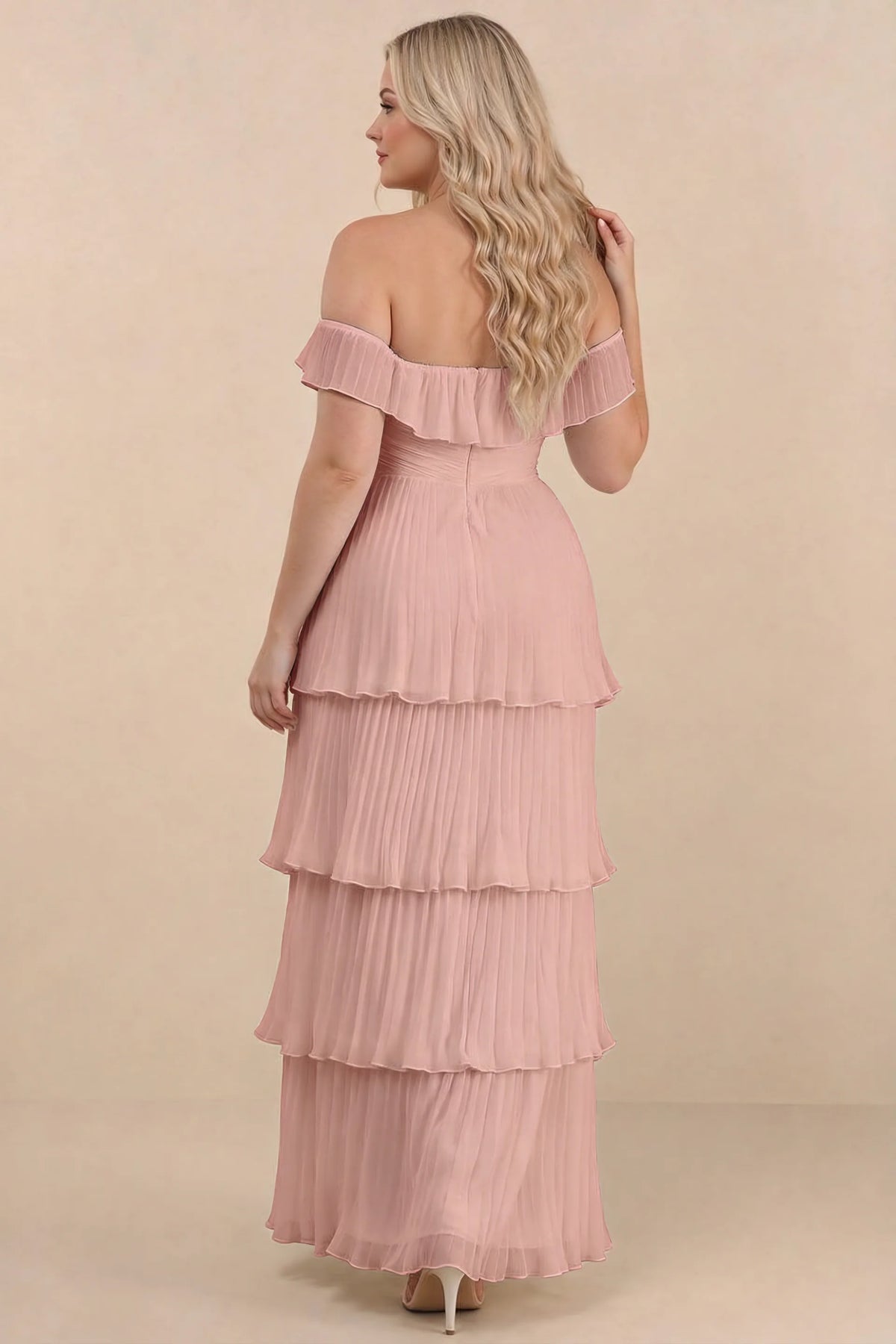 Rear view on a second model of Seraphina light pink tiered ruffle maxi dress with a long flowing skirt
