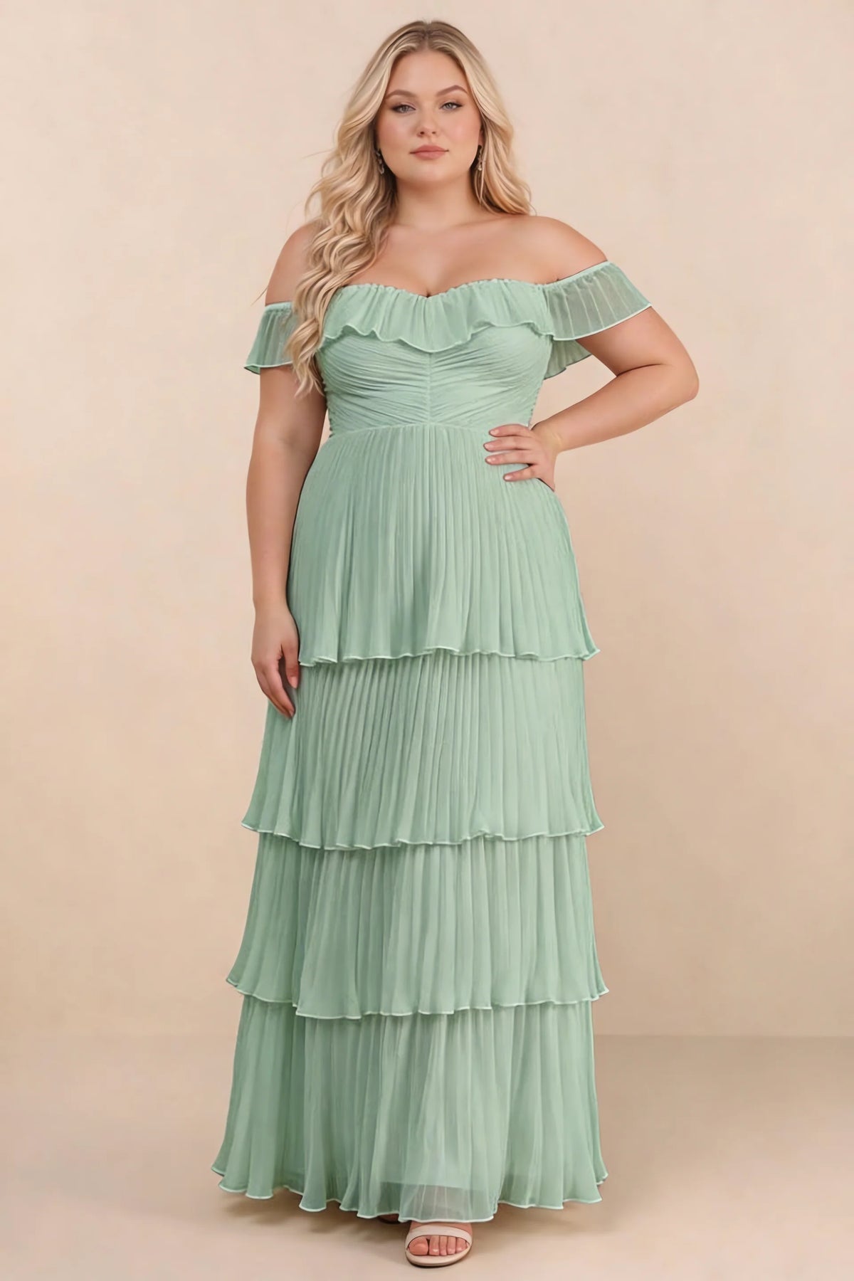 Front view on a second model of Seraphina matcha green tiered ruffle maxi dress with a long flowing skirt
