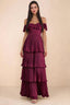 Front studio view of Seraphina merlot tiered ruffle maxi dress with a long flowing skirt
