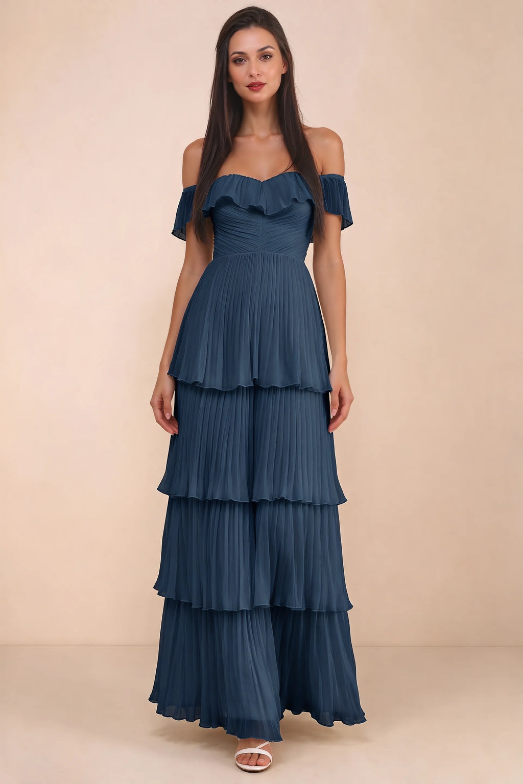 Front studio view of Seraphina navy tiered ruffle maxi dress with a long flowing skirt