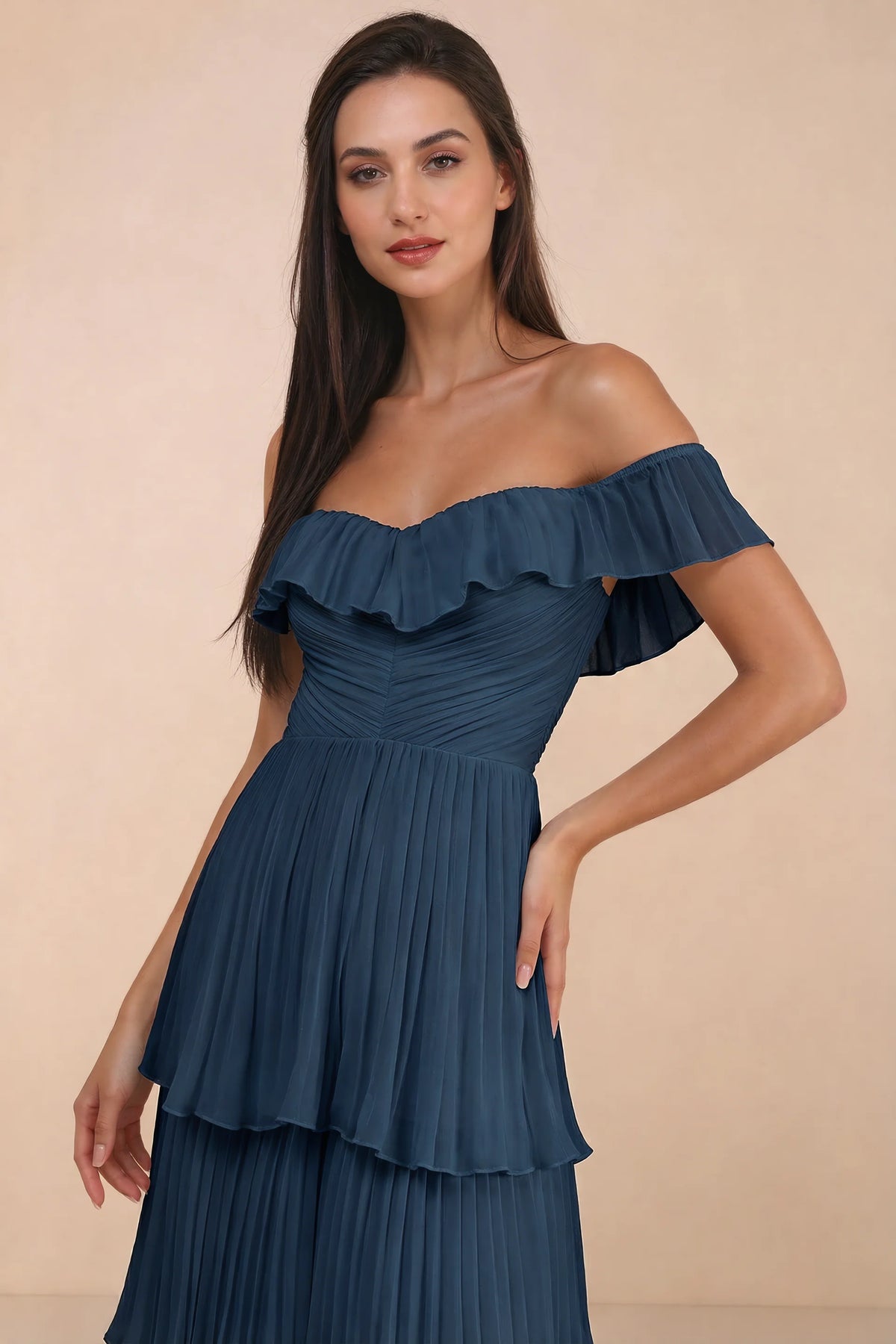 Close-up of shallow sweetheart neckline and off-shoulder ruffle and tiered skirt of Seraphina navy tiered ruffle maxi dress