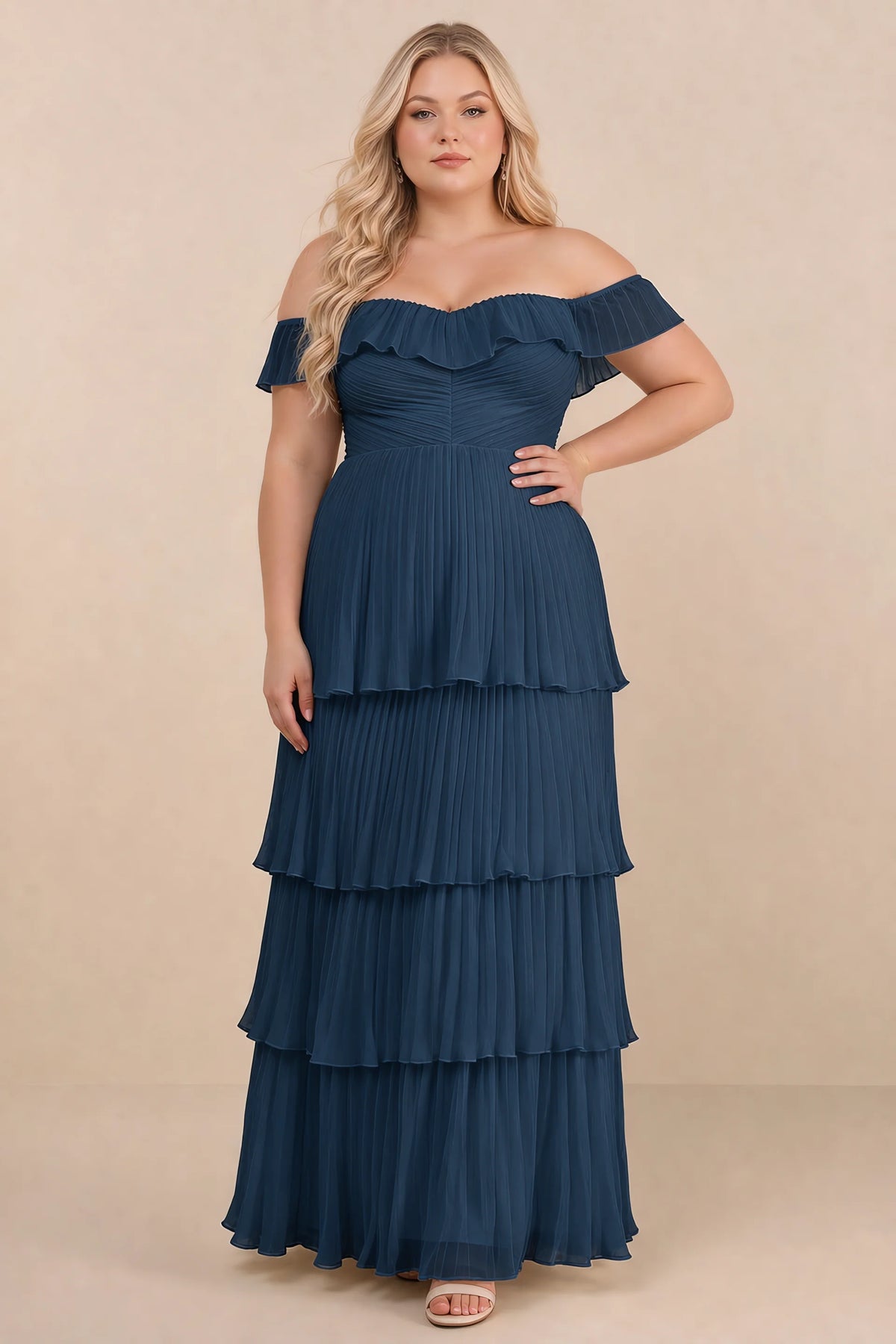 Front view on a second model of Seraphina navy tiered ruffle maxi dress with a long flowing skirt