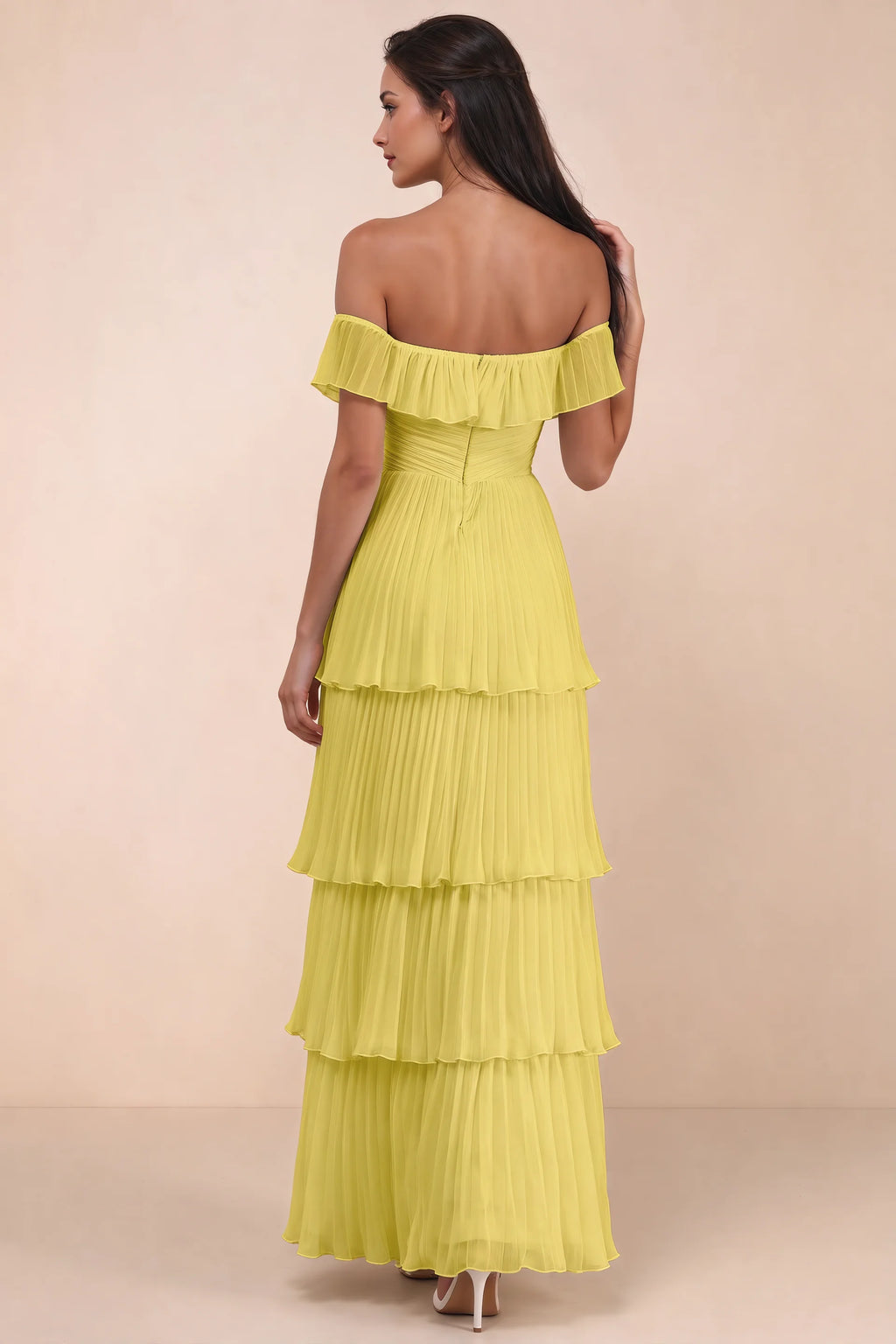 Rear studio view of Seraphina pastel yellow tiered ruffle maxi dress with a long flowing skirt