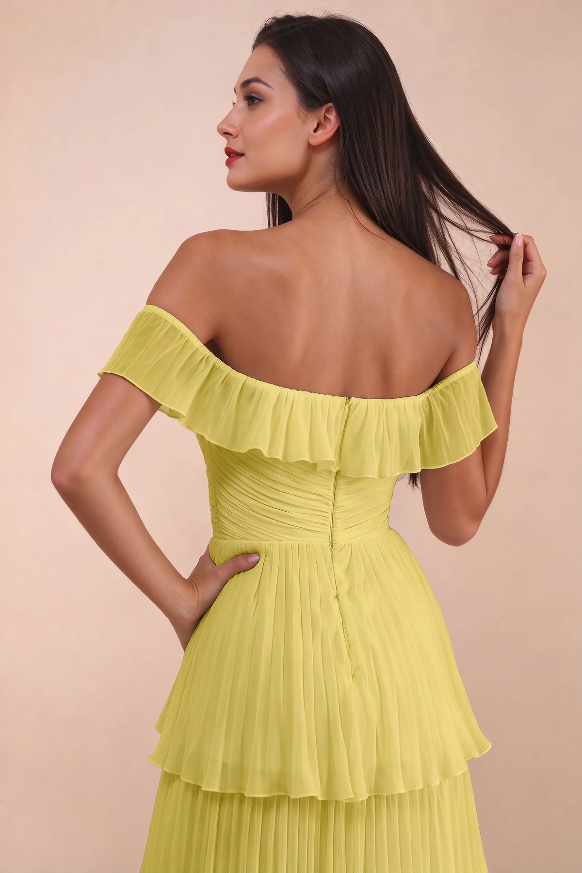Close-up of back neckline ruffle, ruching and centre-back zipper of Seraphina pastel yellow tiered ruffle maxi dress